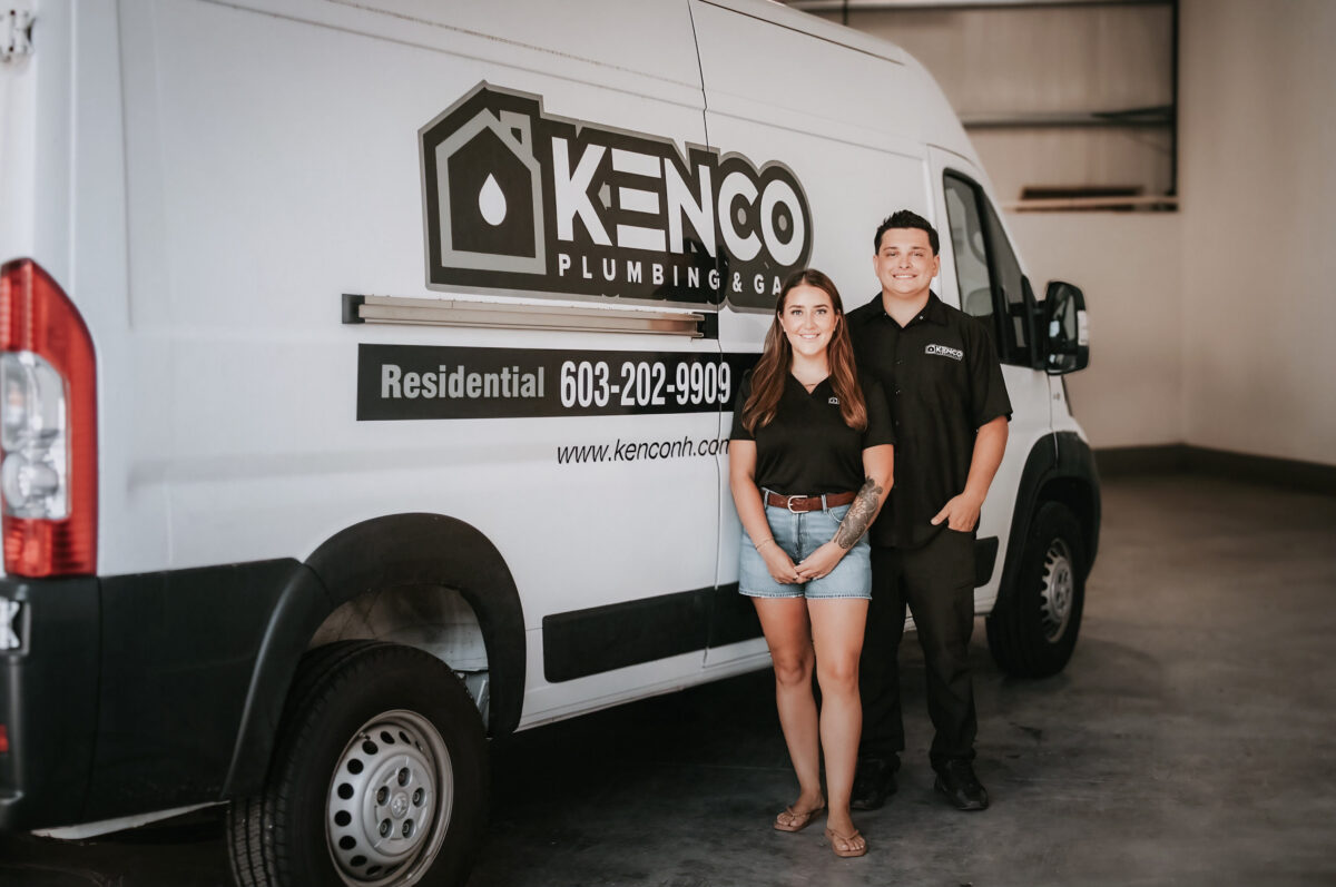 how deep are sewer lines buried team standing against branded van