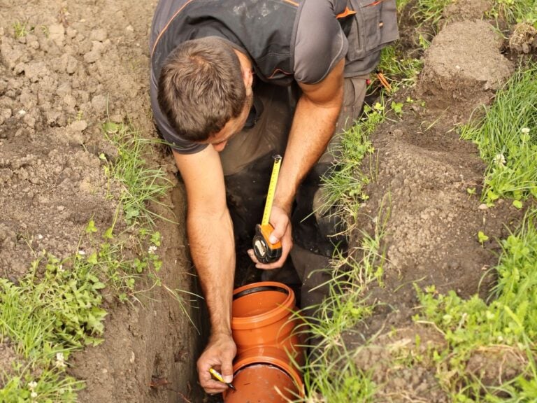 guy fixing sewer line